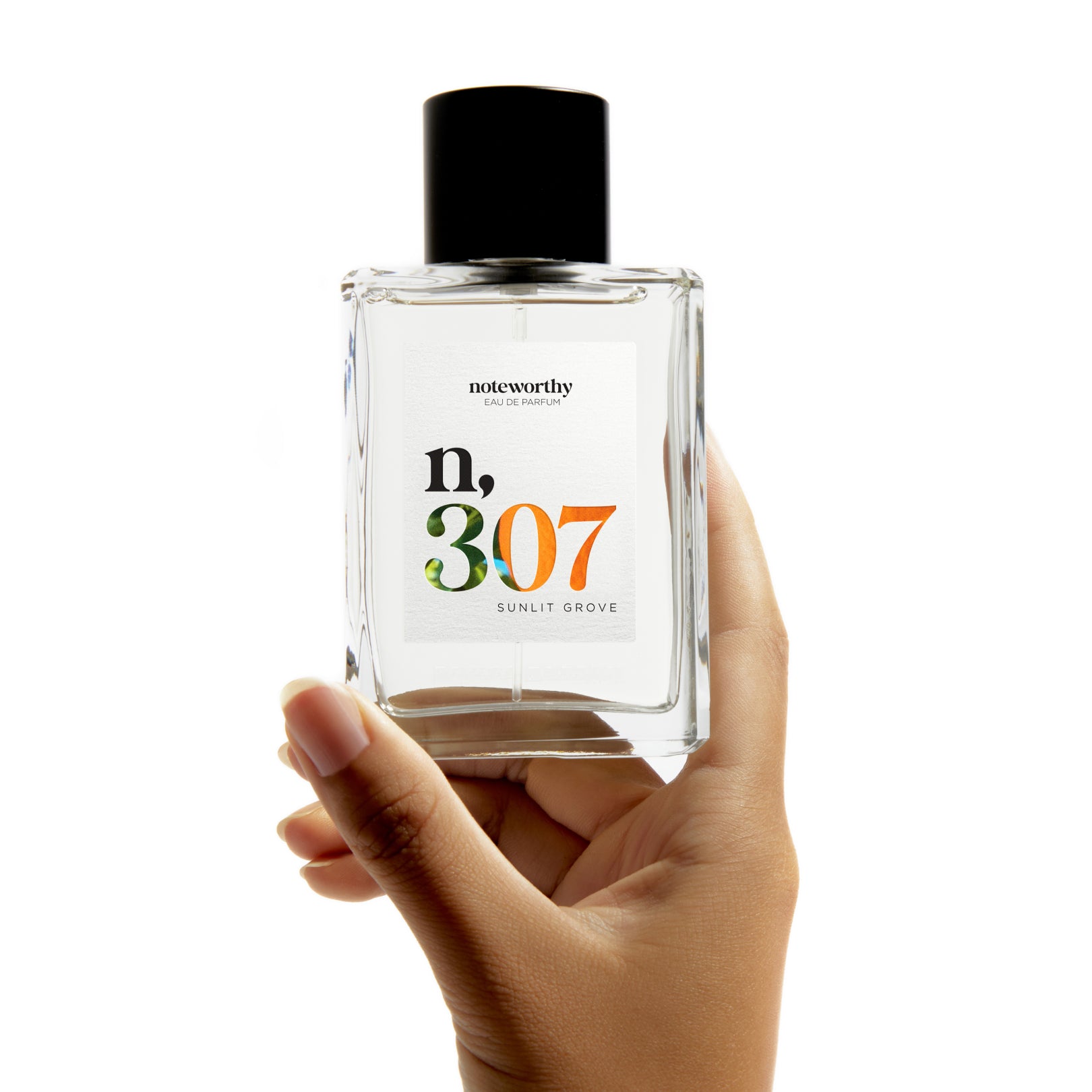 Mandarin, Woody Eau De Parfum n,307 in 100ml bottle, representing invigorating citrus and warm sandalwood notes